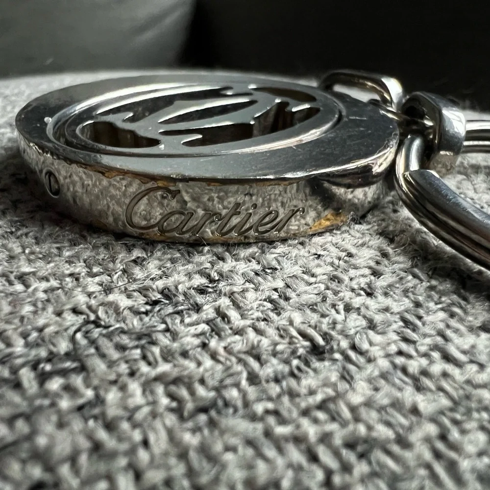 Cartier Silvertone stainless steel pivoting Double C key ring